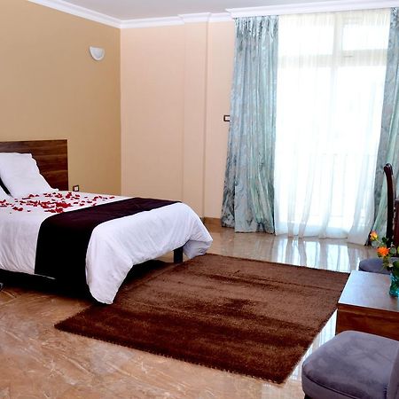 Melodie Hotel Аддис-Абеба Экстерьер фото