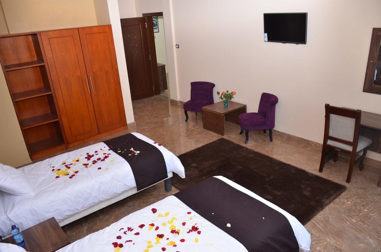 Melodie Hotel Аддис-Абеба Экстерьер фото