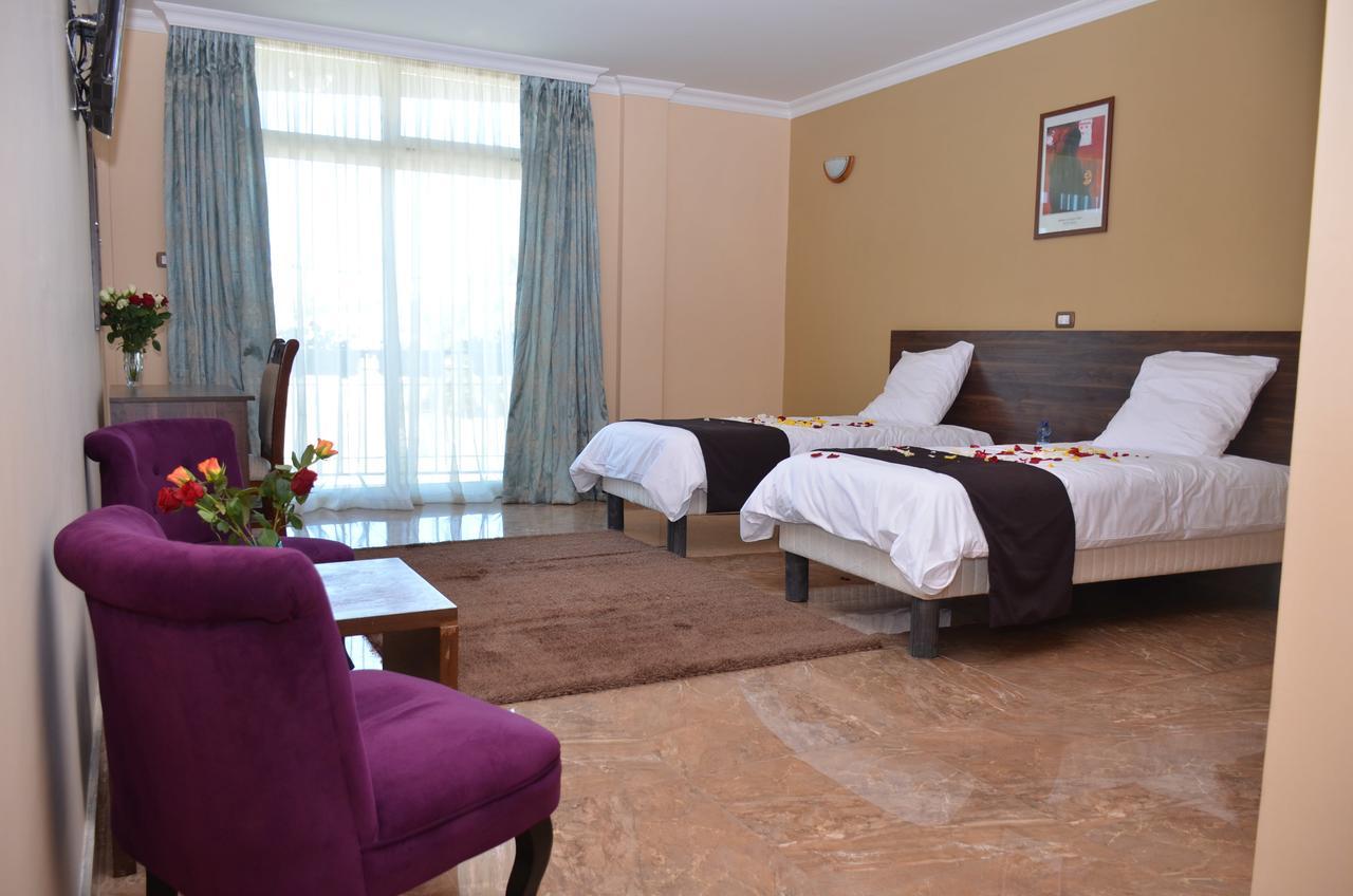 Melodie Hotel Аддис-Абеба Экстерьер фото