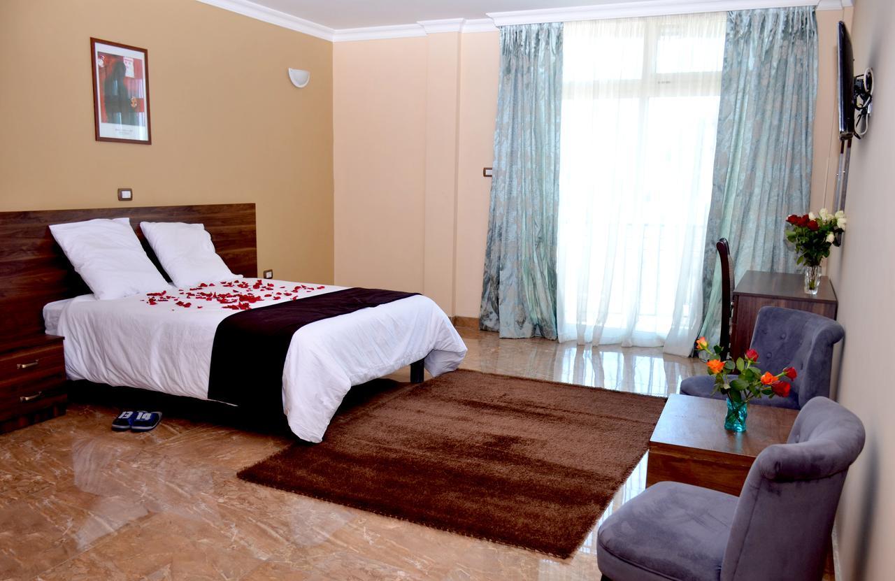 Melodie Hotel Аддис-Абеба Экстерьер фото