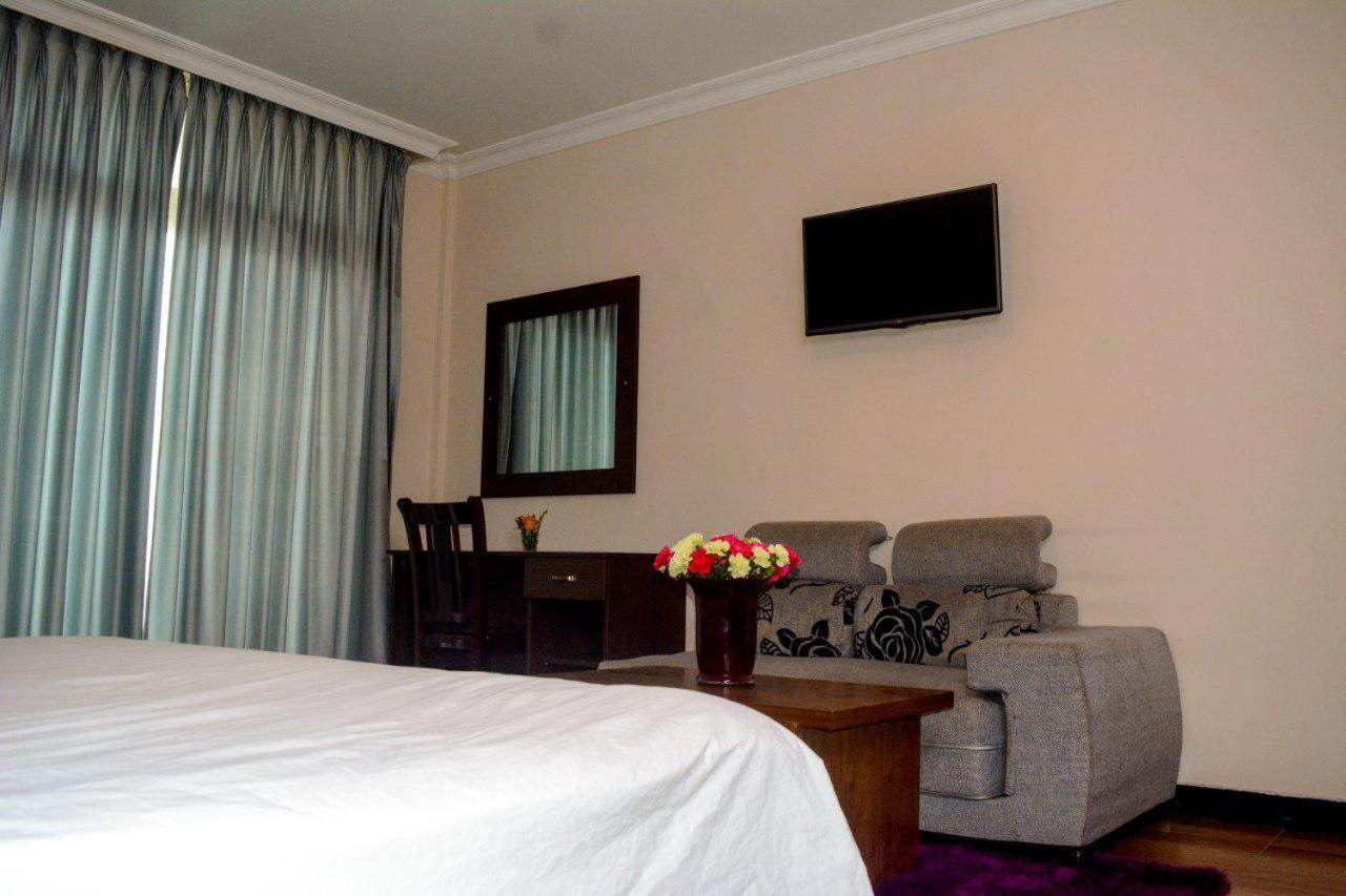 Melodie Hotel Аддис-Абеба Экстерьер фото